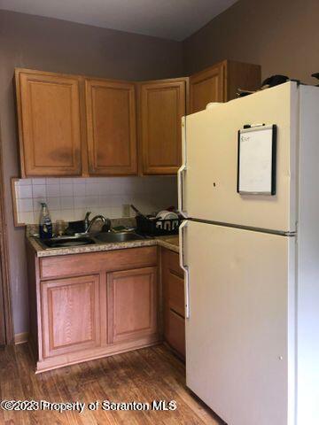 501 North Bromley Avenue Scranton, PA 18504 - Photo 12 of 17 a kitchen with a refrigerator and a stove