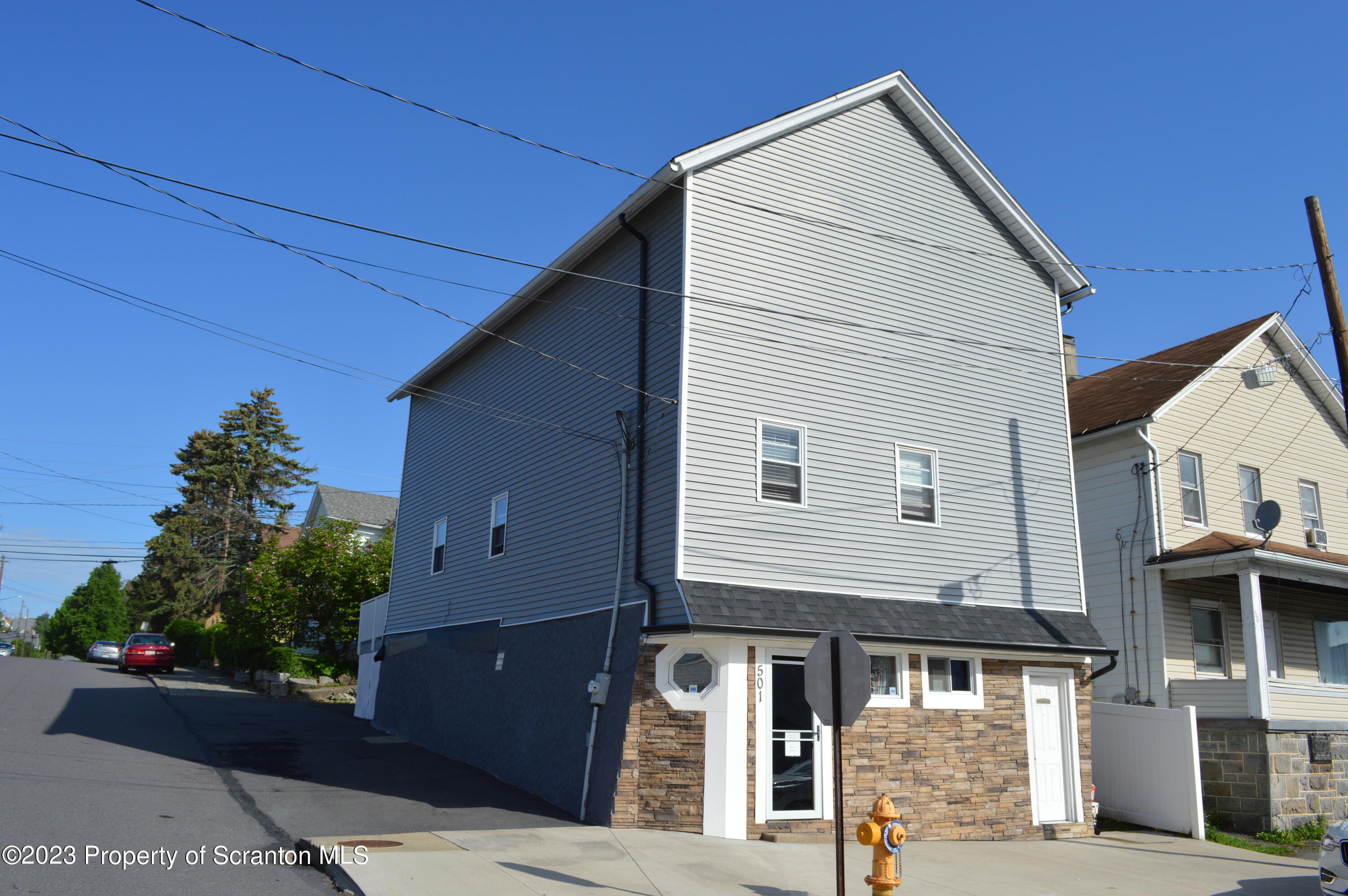 501 North Bromley Avenue Scranton, PA 18504 - Photo 14 of 17 a front view of a house with garden