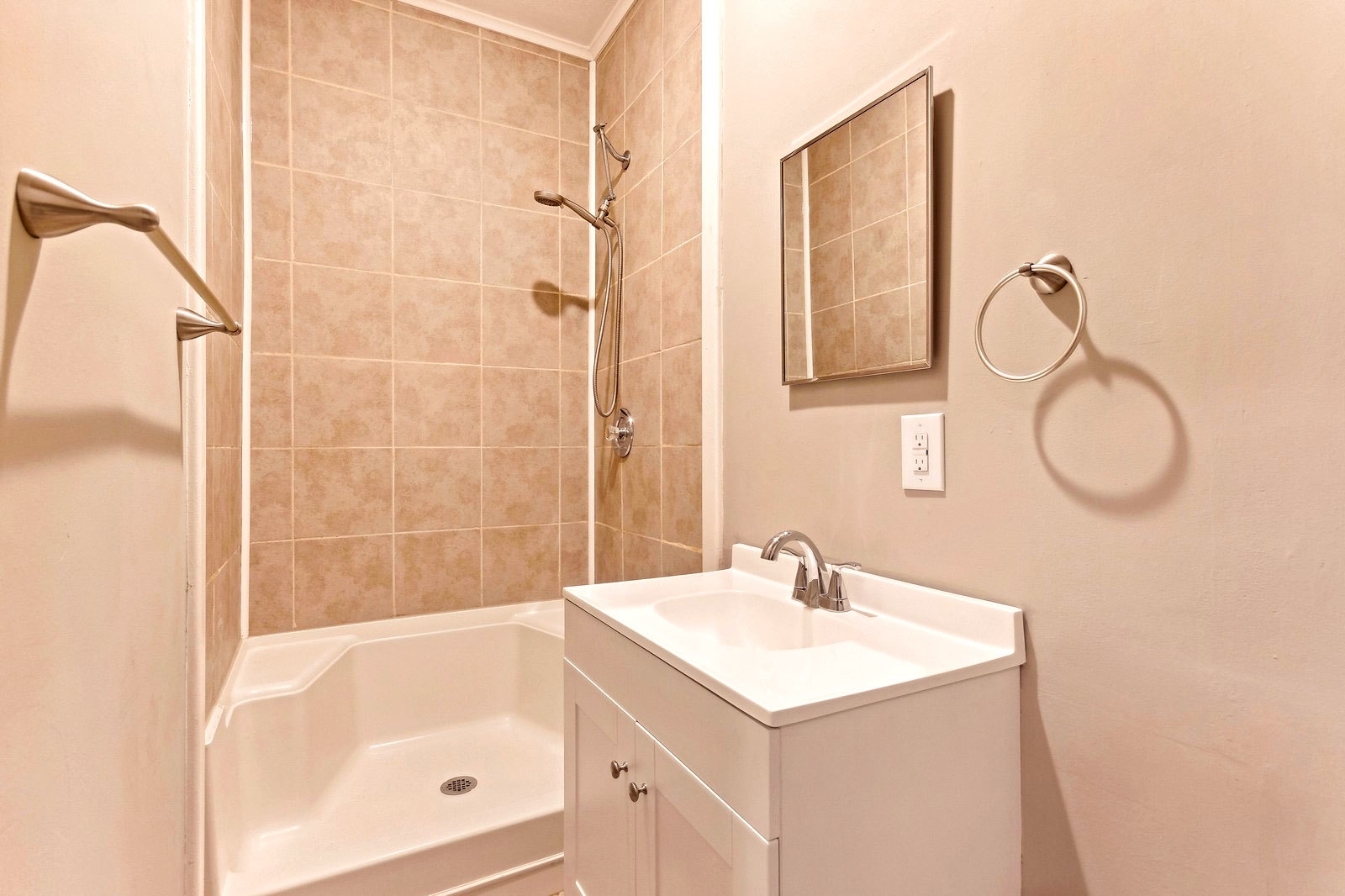 169 South Schuyler Avenue, Unit 34 Kankakee, IL 60901 - Photo 14 of 19 a bathroom with a sink and a mirror