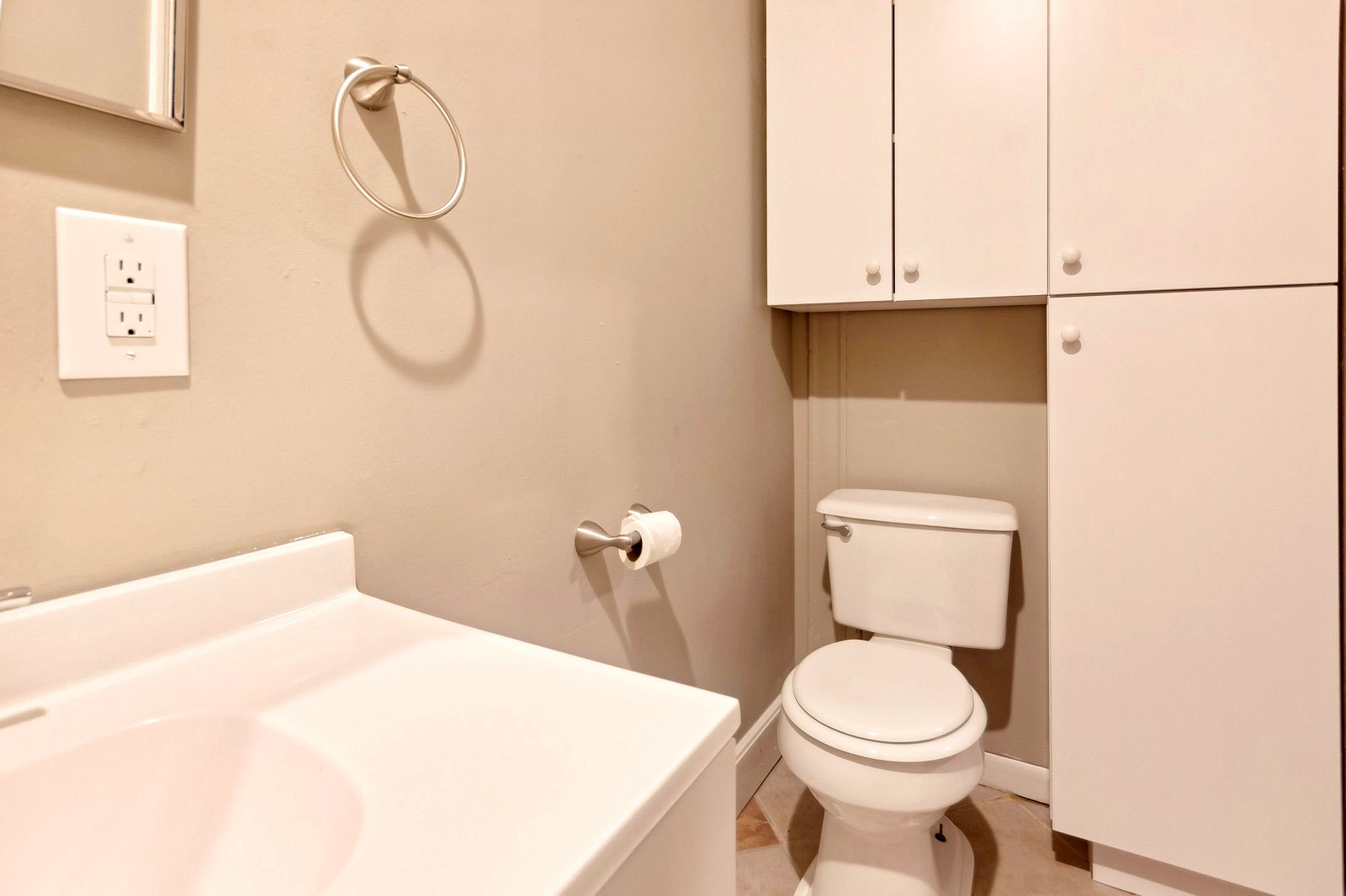 169 South Schuyler Avenue, Unit 34 Kankakee, IL 60901 - Photo 15 of 19 a white toilet sitting next to a bathroom