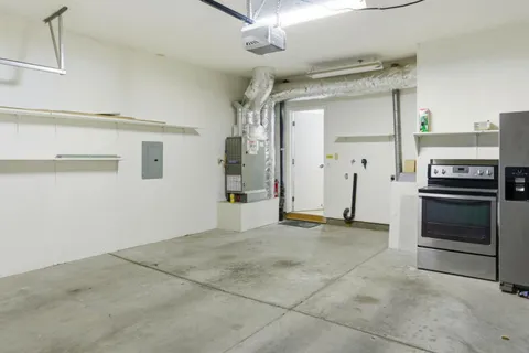 a view of a kitchen with a sink and dishwasher kitchen view