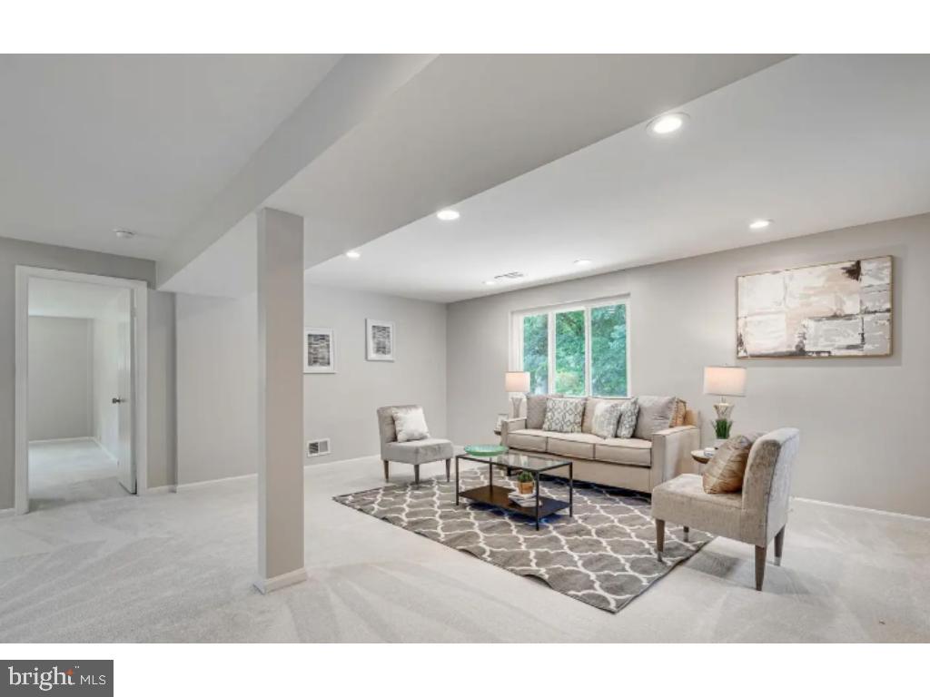3919 Littleton Street Silver Spring, MD 20906 - Photo 13 of 17 a living room with furniture and a large window