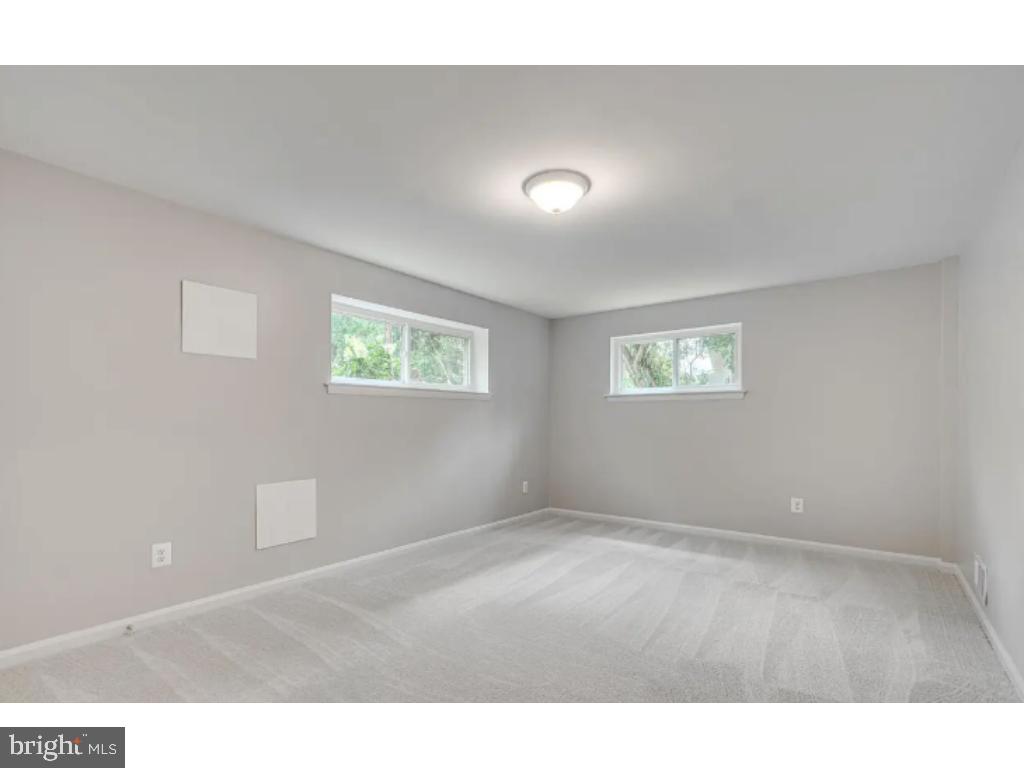 3919 Littleton Street Silver Spring, MD 20906 - Photo 14 of 17 a view of an empty room and a window