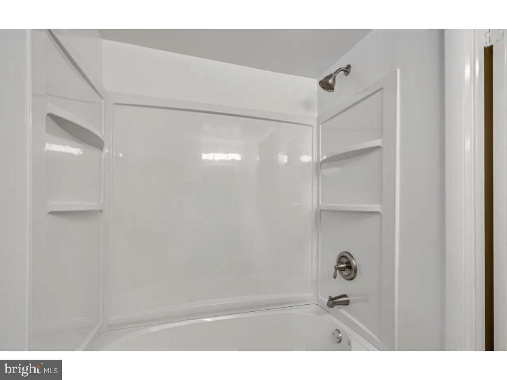 3919 Littleton Street Silver Spring, MD 20906 - Photo 16 of 17 a bathroom with a shower