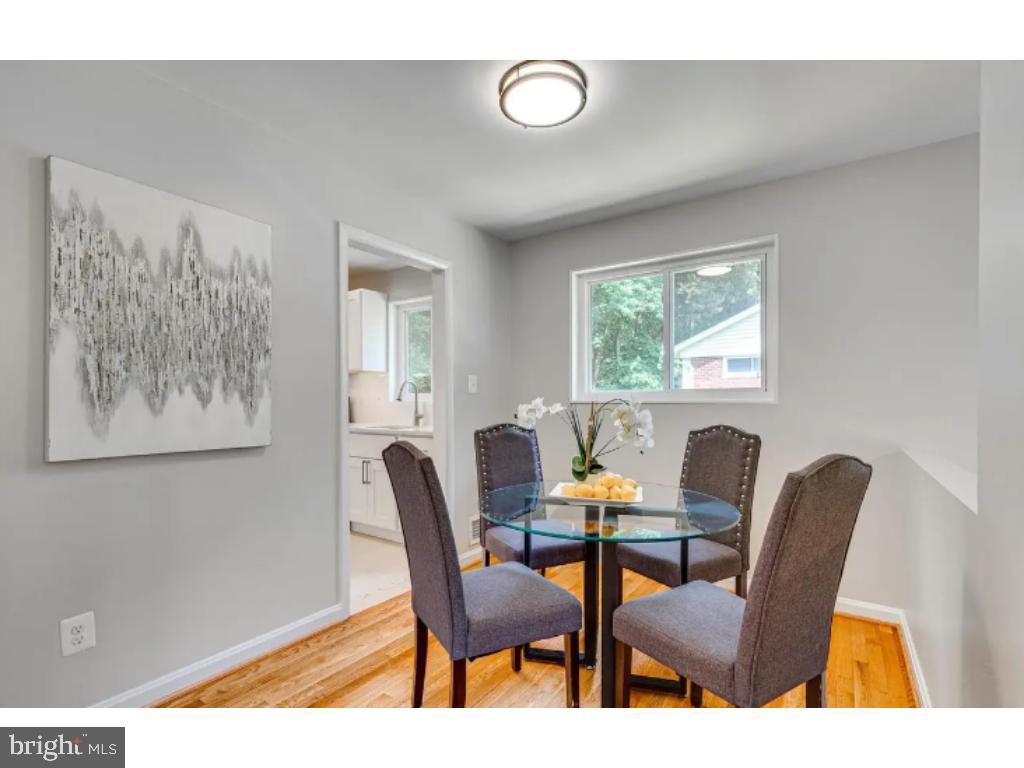 3919 Littleton Street Silver Spring, MD 20906 - Photo 5 of 17 a view of a dining room with furniture and window