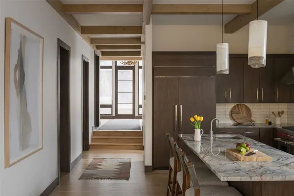a view of dining room and cabinets