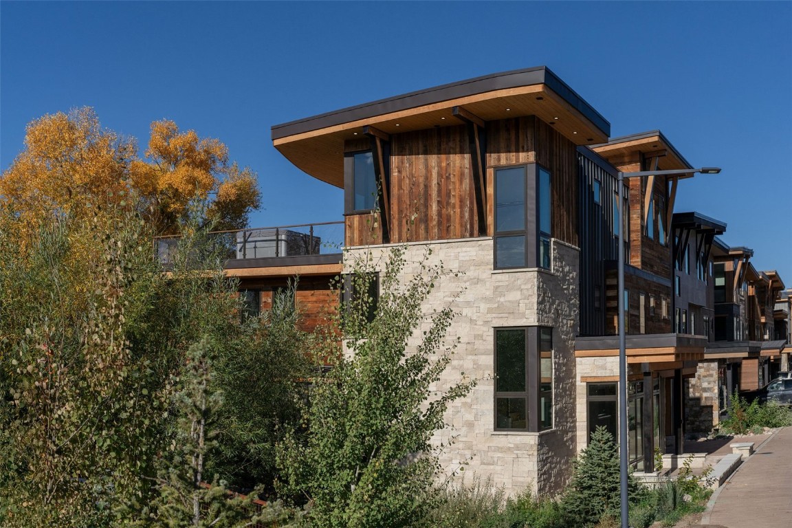321 Riverview Way Steamboat Springs, CO 80487 - Photo 38 of 50 a front view of a house with yard
