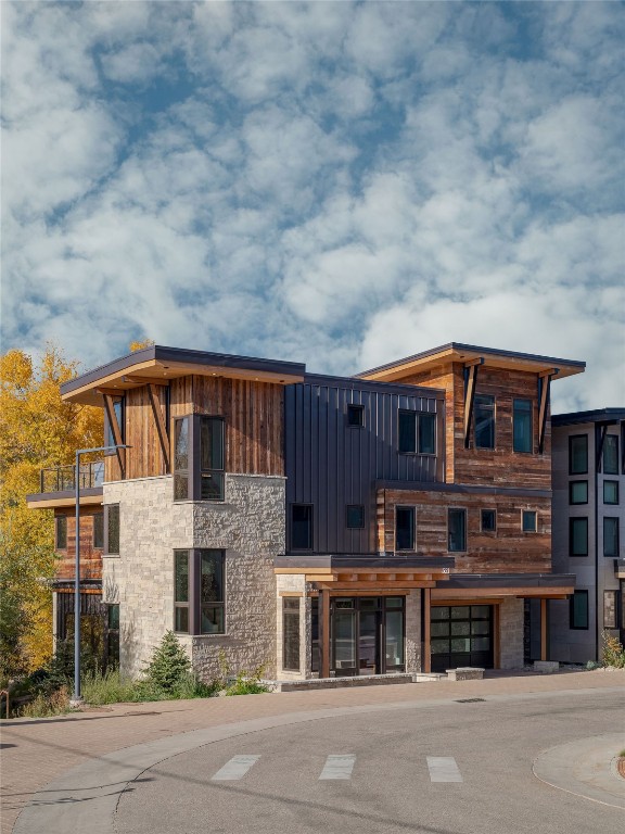 321 Riverview Way Steamboat Springs, CO 80487 - Photo 39 of 50 a front view of a house with a yard