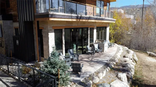 a view of a cafe with sitting area