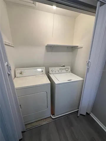 a utility room with dryer and washer