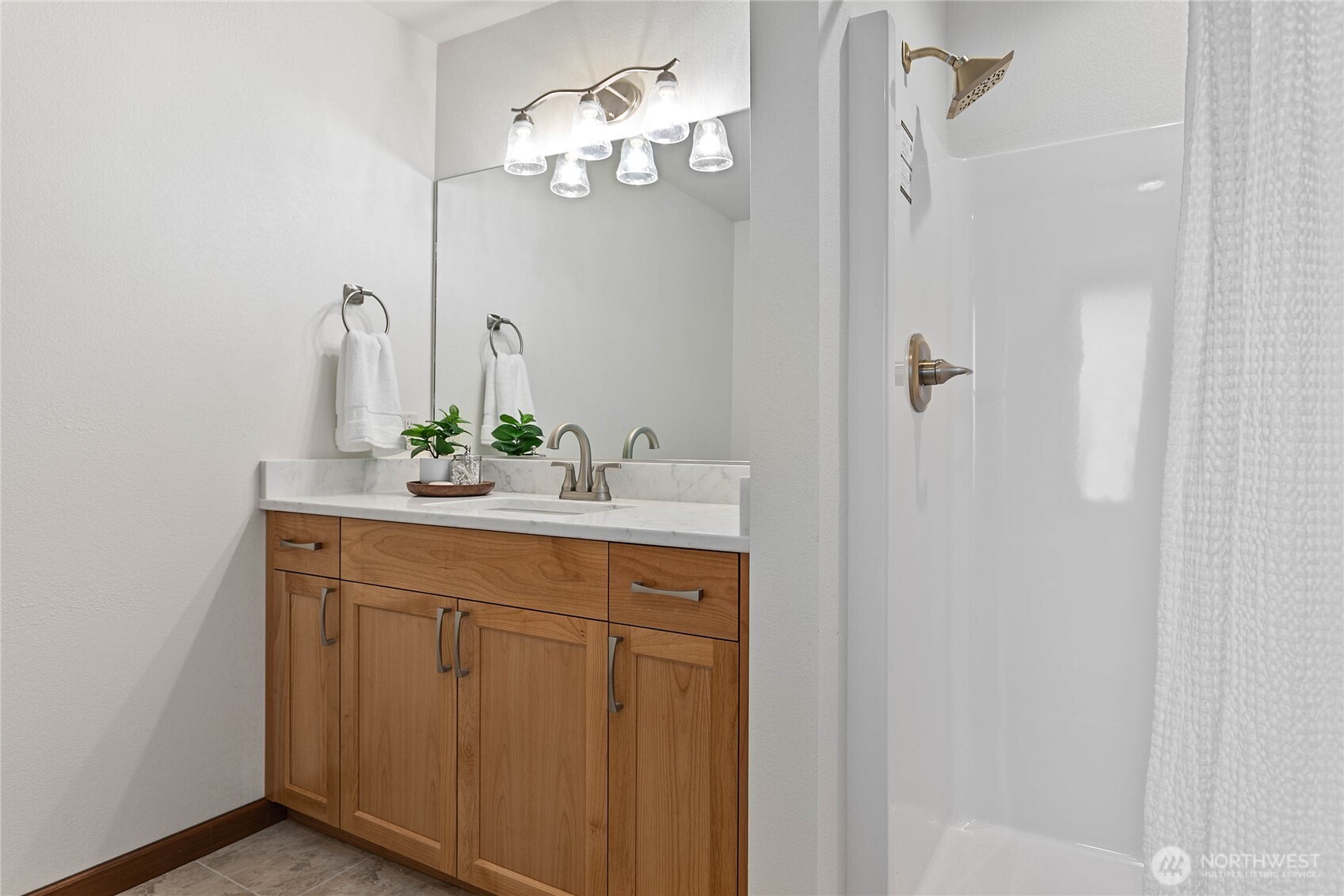 1133 East Pole Road Everson, WA 98247 - Photo 13 of 40 a bathroom with a sink vanity and a mirror