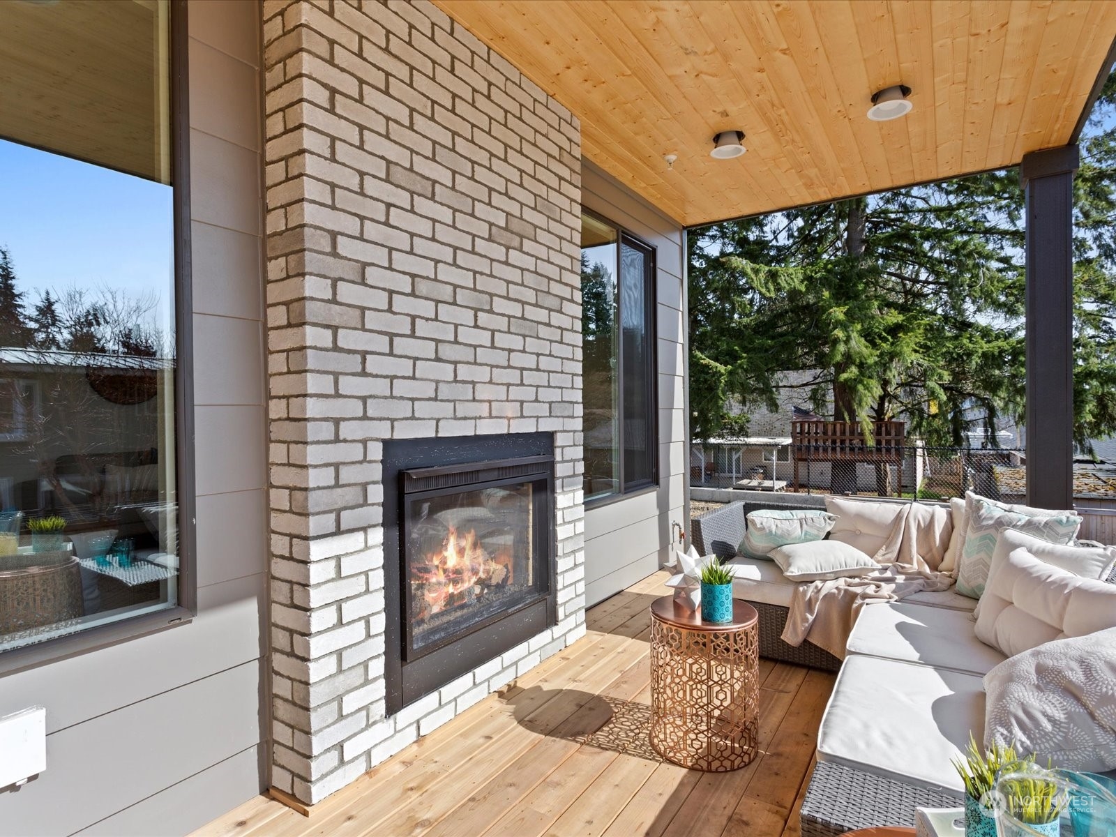 21615 1st Avenue West Bothell, WA 98021 - Photo 39 of 39 a living room with furniture and a fireplace