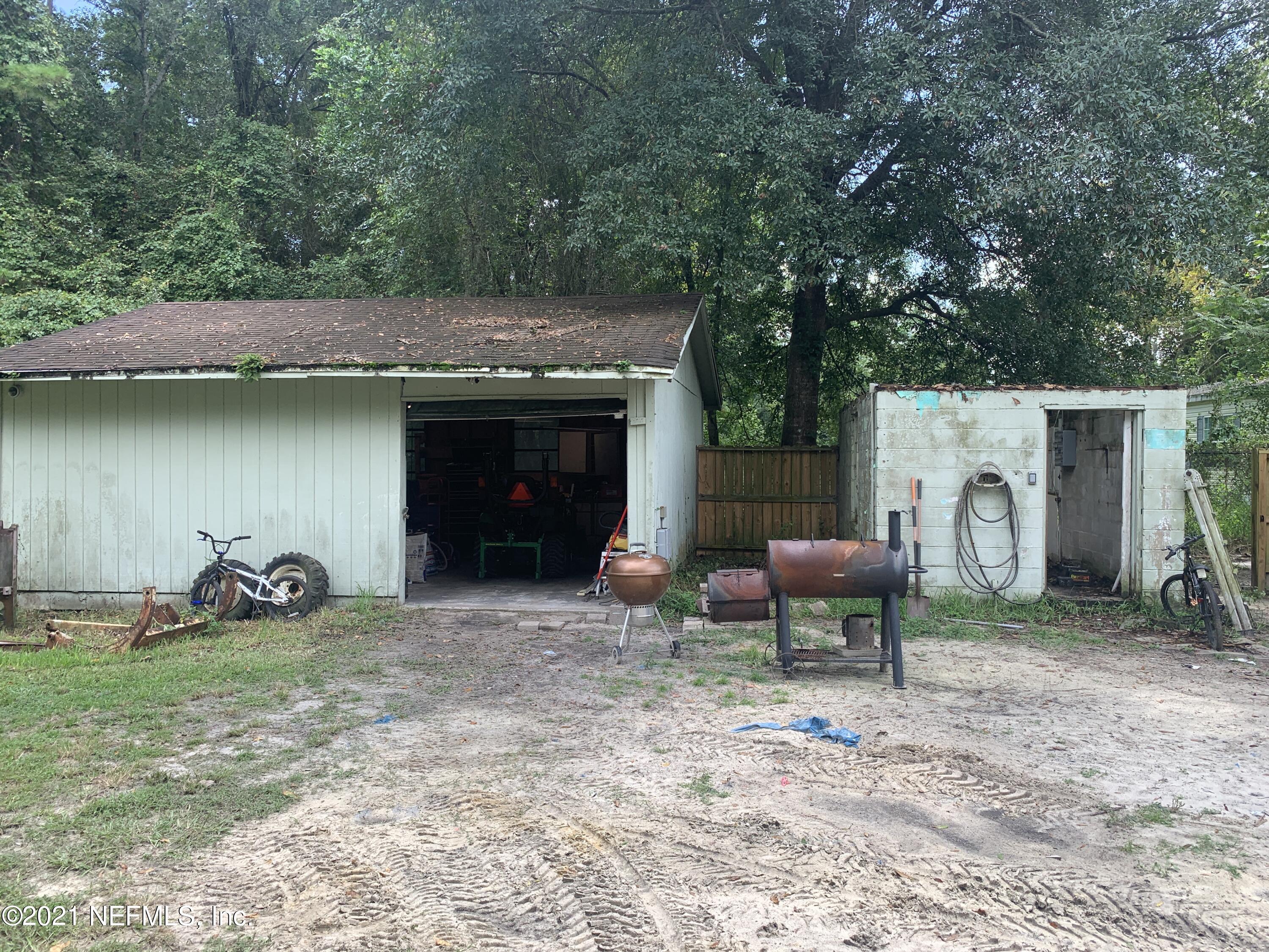 12505 Pulaski Road Jacksonville, FL 32218 - Photo 11 of 45 Back garage and shed