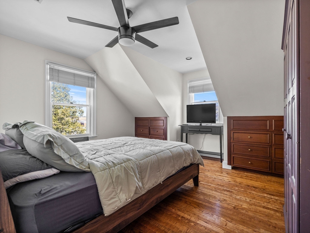428 Washington Street Canton, MA 02021 - Photo 14 of 31 a bedroom with a bed and a flat screen tv