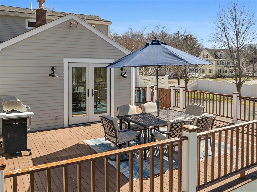 428 Washington Street Canton, MA 02021 - Photo 21 of 31 a view of a patio with a table and chairs