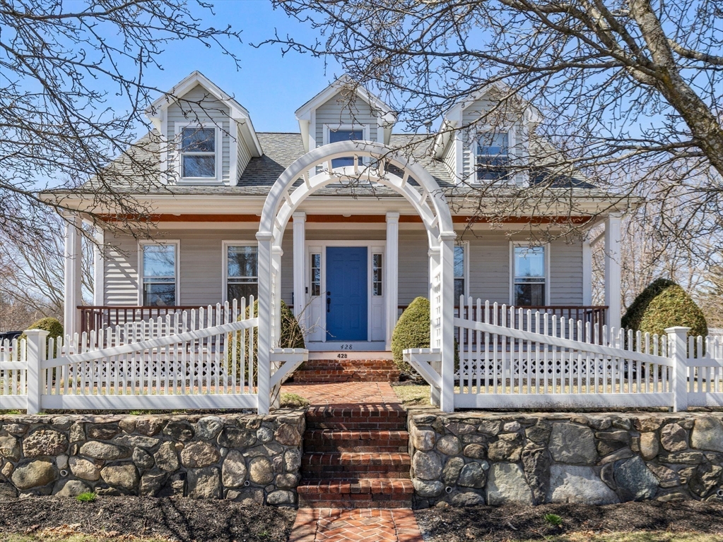 428 Washington Street Canton, MA 02021 - Photo 22 of 31 a front view of a house with a iron gate