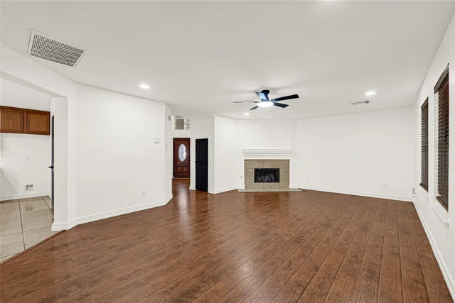 a kitchen with stainless steel appliances granite countertop a stove sink and cabinets