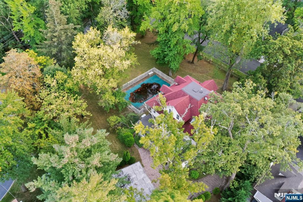 285 Maple Street Englewood, NJ 07631 - Photo 28 of 29 an aerial view of a house with a yard and swimming pool