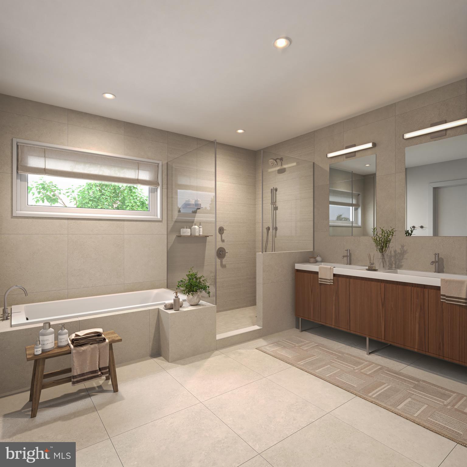835 Fernon Street Philadelphia, PA 19148 - Photo 8 of 11 a large spacious bathroom with a large tub shower and sink