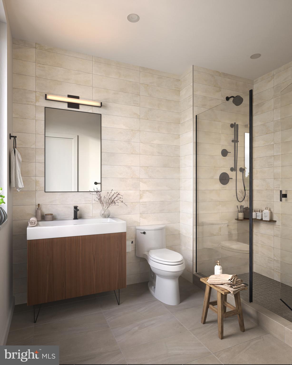 835 Fernon Street Philadelphia, PA 19148 - Photo 10 of 11 a bathroom with a double vanity sink mirror and toilet