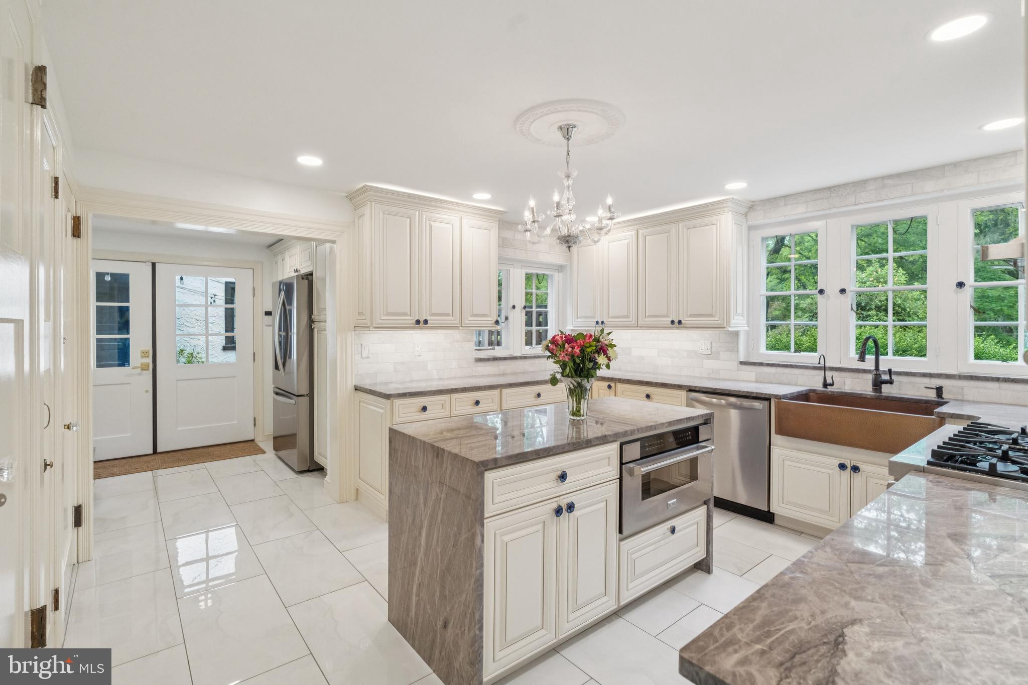 443 Homestead Road Wayne, PA 19087 - Photo 2 of 55 a kitchen with stainless steel appliances granite countertop a sink and cabinets