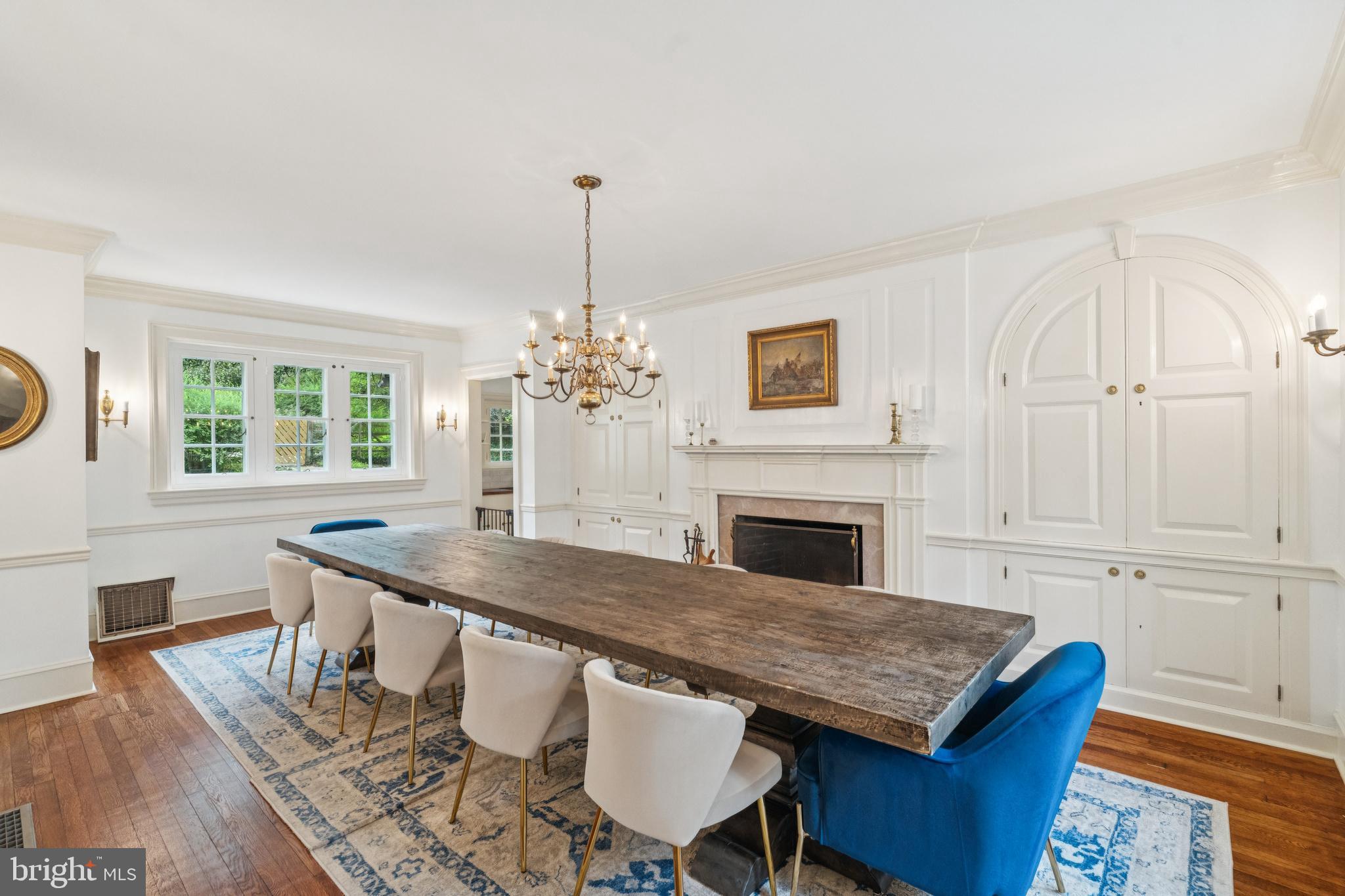 443 Homestead Road Wayne, PA 19087 - Photo 32 of 55 a kitchen with a table chairs and a wooden floor