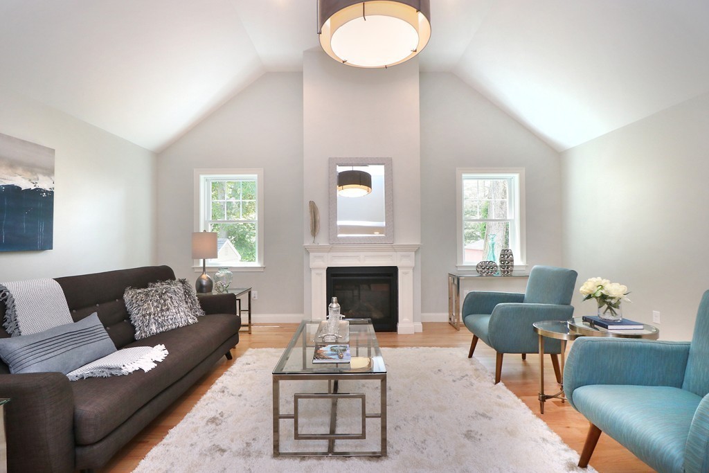6 Tower Road Arlington, MA 02474 - Photo 11 of 30 a living room with furniture and a fireplace