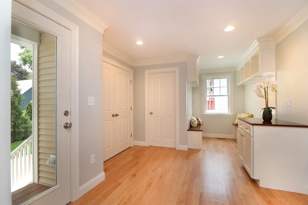 6 Tower Road Arlington, MA 02474 - Photo 14 of 30 a bedroom with wooden floor and windows
