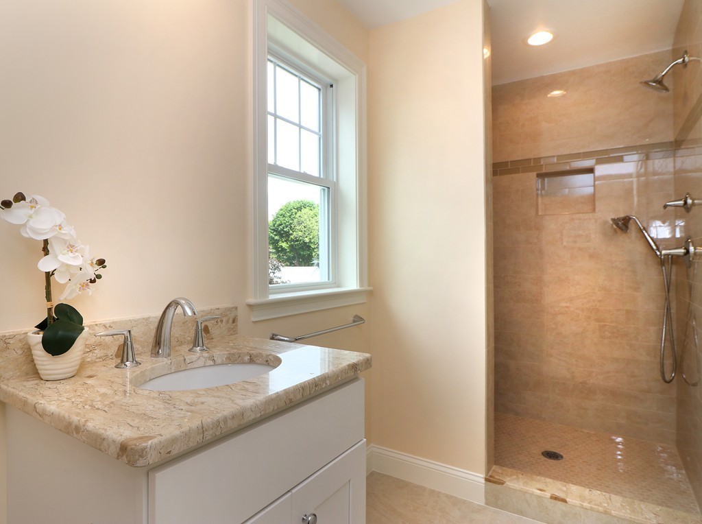 6 Tower Road Arlington, MA 02474 - Photo 26 of 30 a bathroom with a sink and a mirror