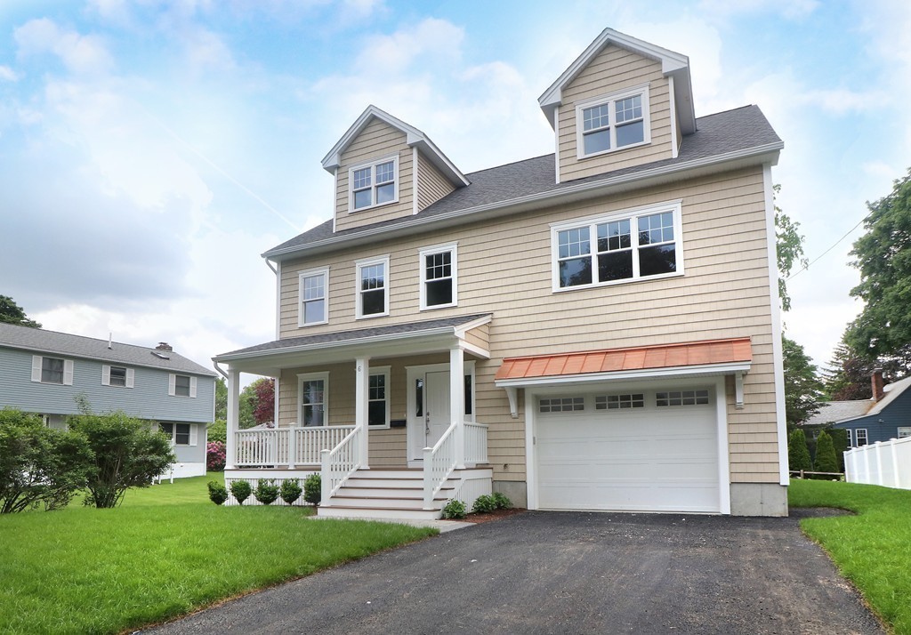6 Tower Road Arlington, MA 02474 - Photo 4 of 30 a front view of a house with a yard
