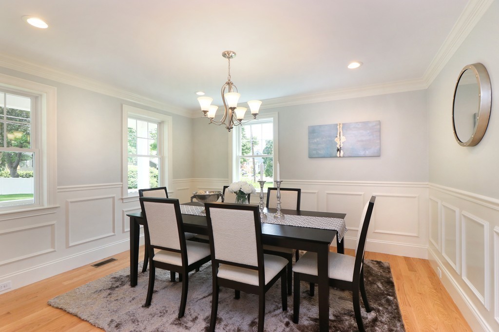 6 Tower Road Arlington, MA 02474 - Photo 5 of 30 a view of a dining room with furniture and chandelier