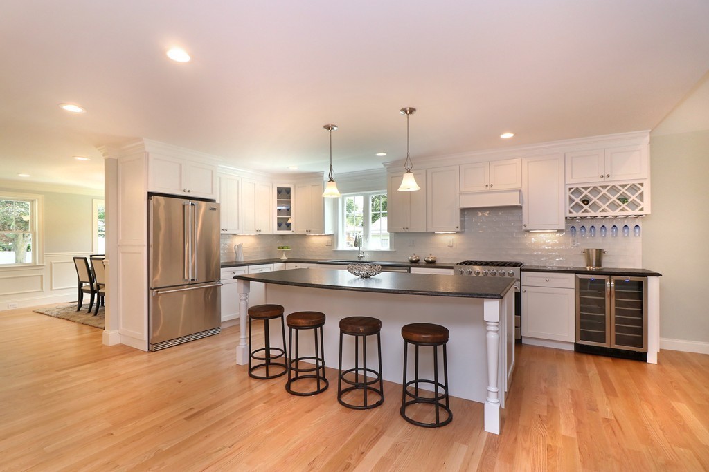 6 Tower Road Arlington, MA 02474 - Photo 7 of 30 a kitchen with refrigerator cabinets and wooden floor