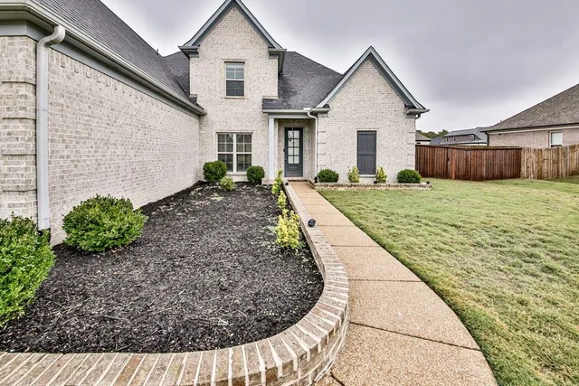 a view of a house with a patio