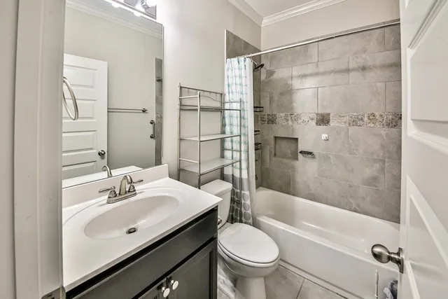 a view of a kitchen with wooden floor and electronic appliances