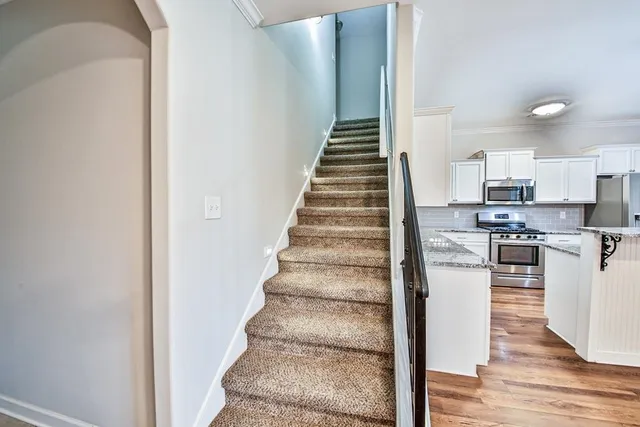 a outdoor living space with furniture and a fireplace