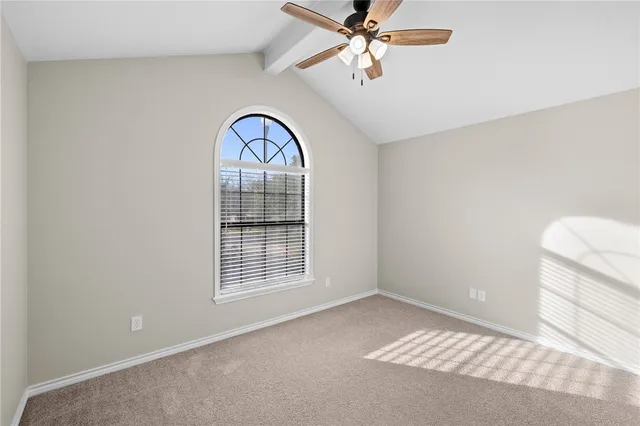 a view of a livingroom with a fan