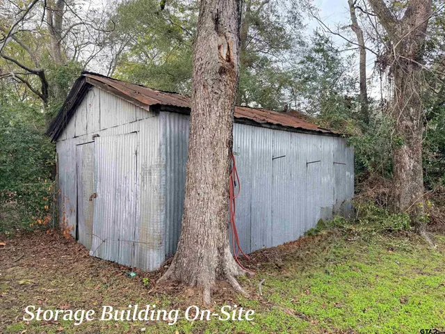 a wooden door in front of a house