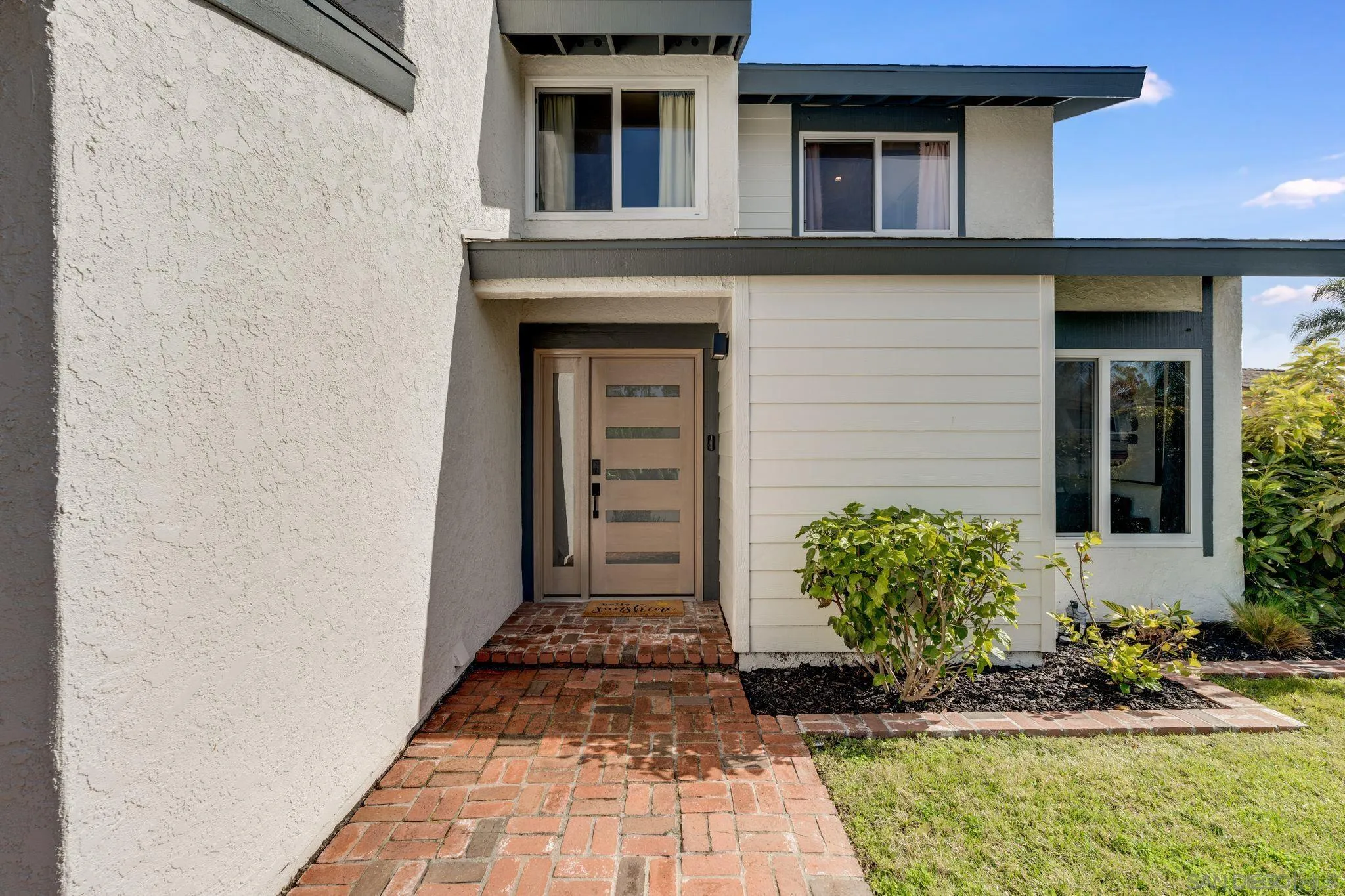 135 Little Oaks Road Encinitas, CA 92024 - Photo 10 of 59 a front view of a house with garden