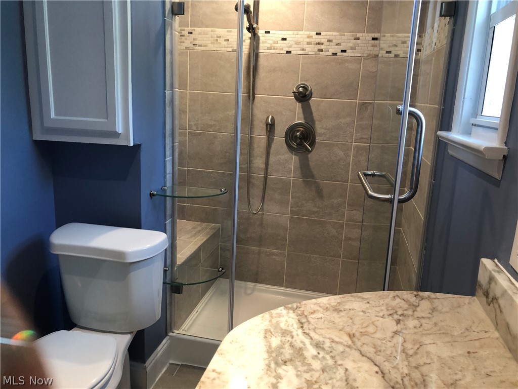 2995 Vincent Road Silver Lake, OH 44224 - Photo 8 of 13 Large tiled walk-in Shower with bench