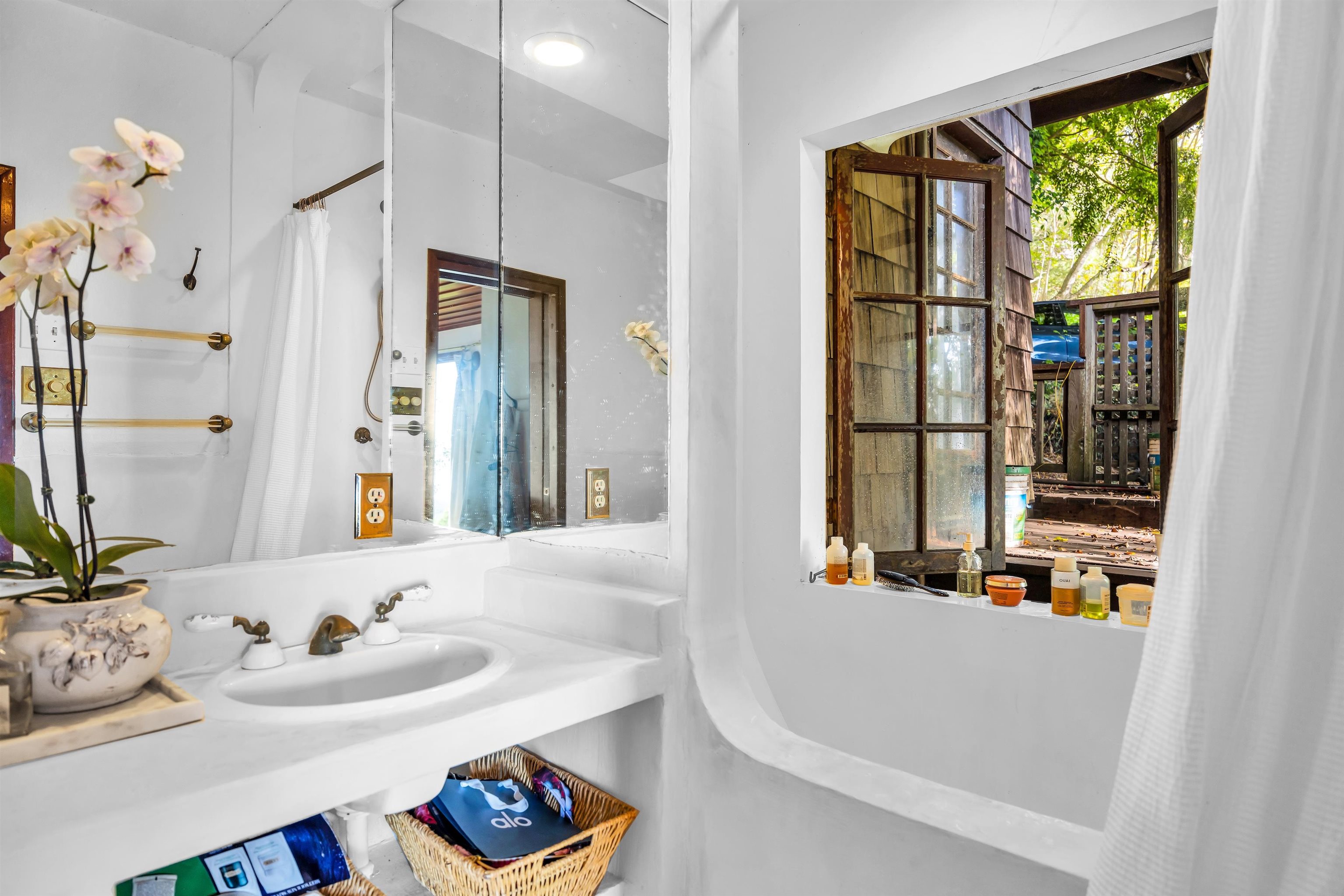 1854 Olinda Road Makawao, HI 96768 - Photo 15 of 26 a bathroom with a sink and a mirror