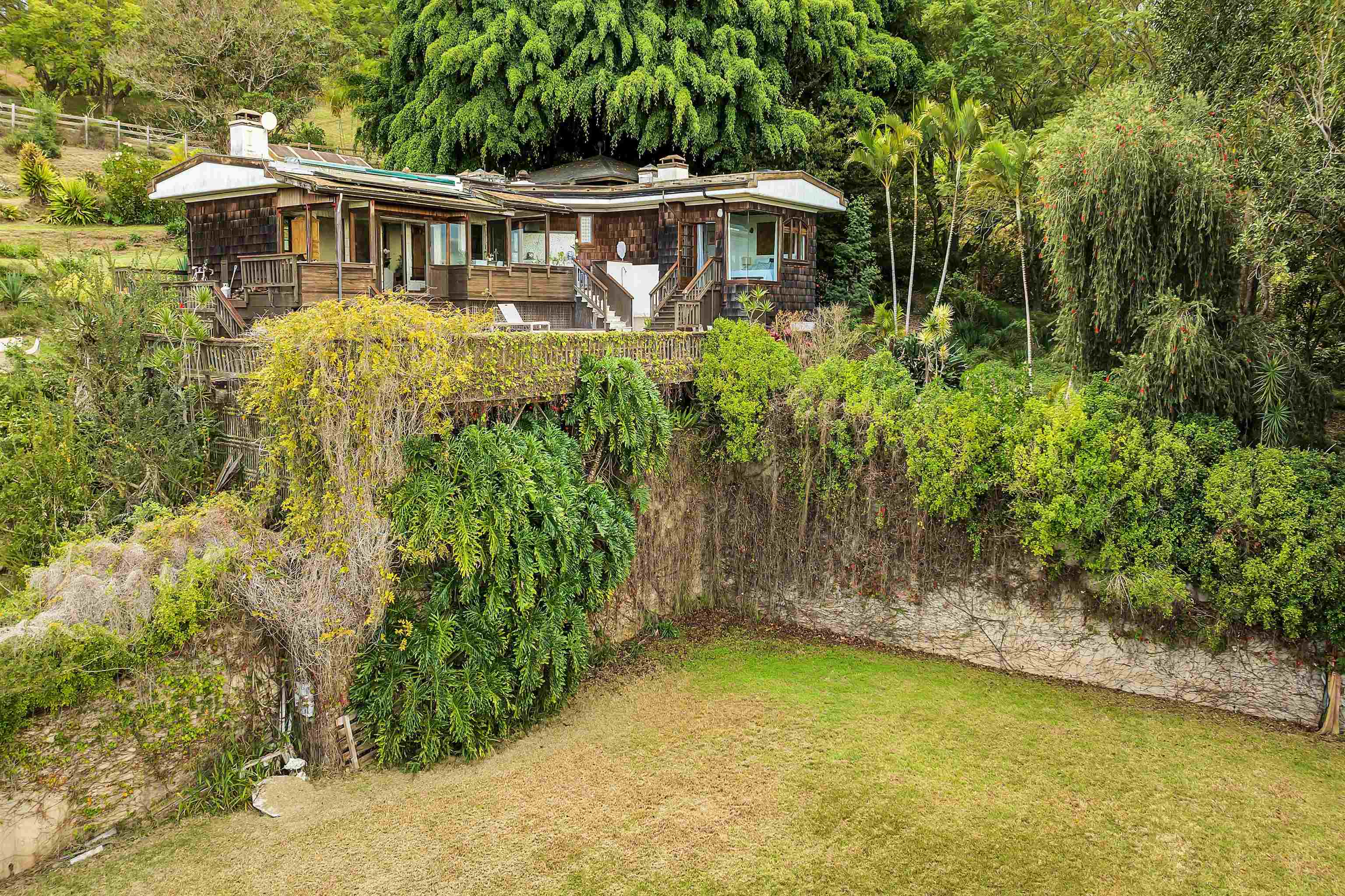 1854 Olinda Road Makawao, HI 96768 - Photo 20 of 26 a front view of a house with a yard