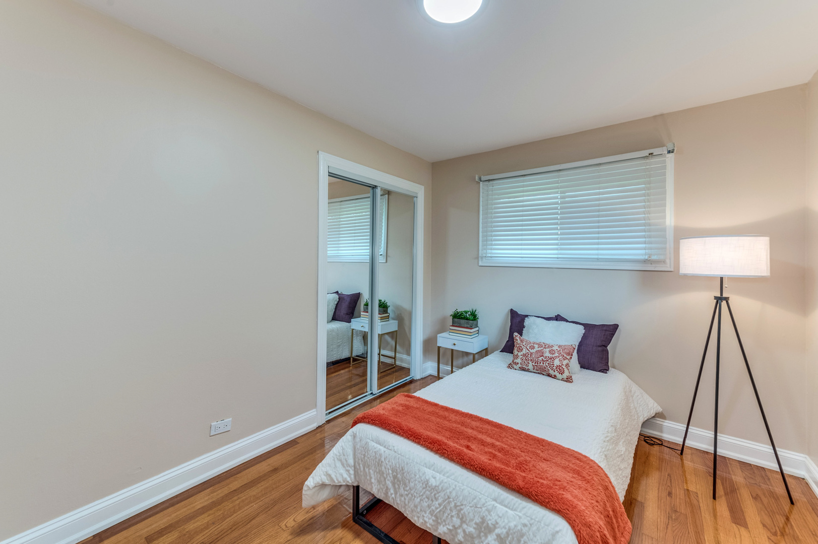 105 North Wolf Road Prospect Heights, IL 60070 - Photo 22 of 26 a bedroom with a bed and wooden floor