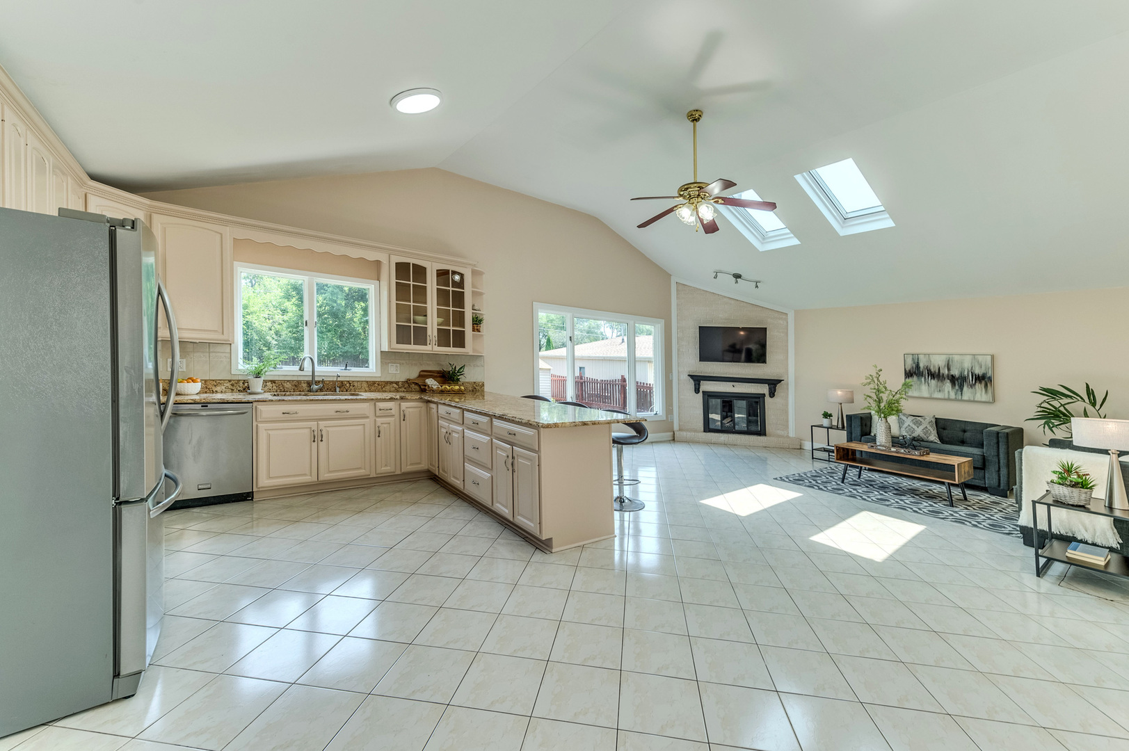 105 North Wolf Road Prospect Heights, IL 60070 - Photo 9 of 26 a kitchen with a sink a counter top space appliances and cabinets