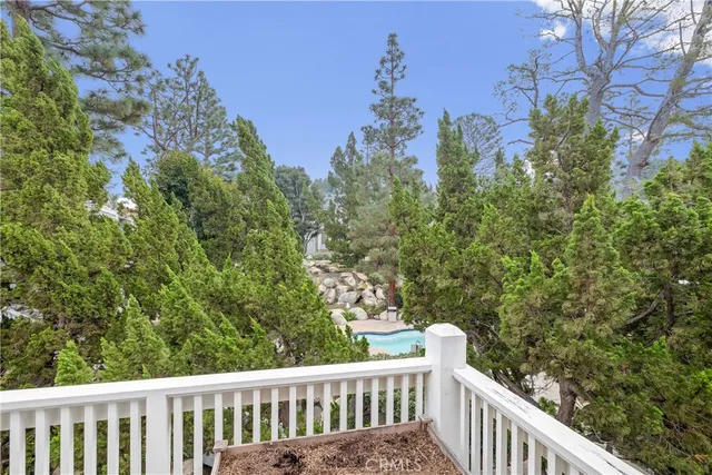 a view of an empty room with a kitchen