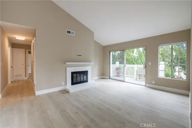 a living room with a fireplace
