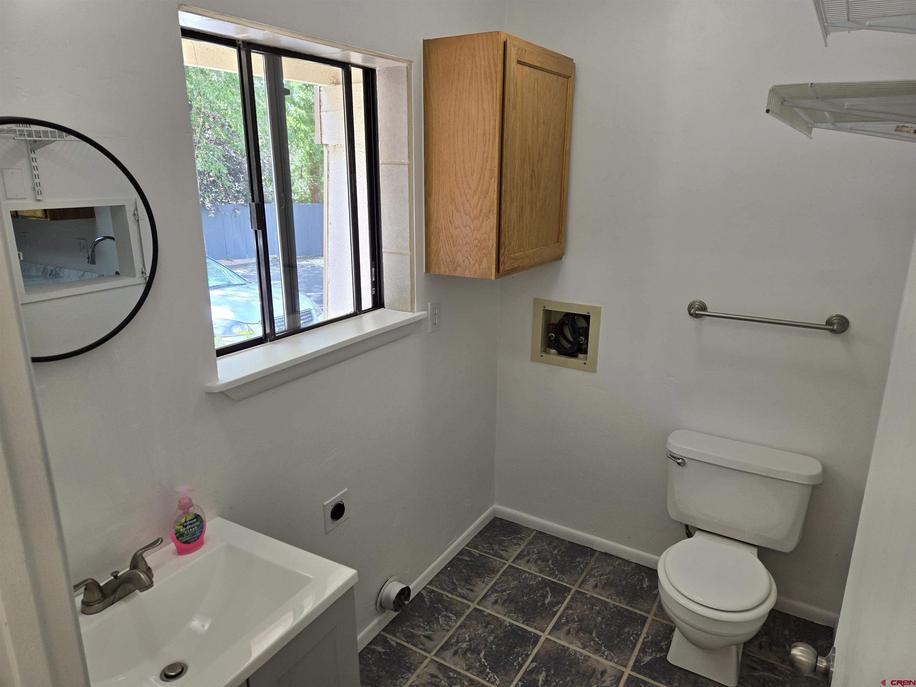 1900 County Road 240, Unit 2A Durango, CO 81301 - Photo 9 of 17 a bathroom with a toilet and a sink