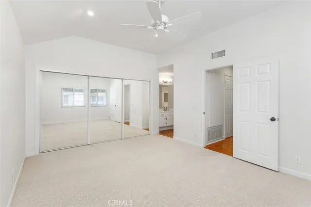 a bathroom with a sink a vanity and a mirror