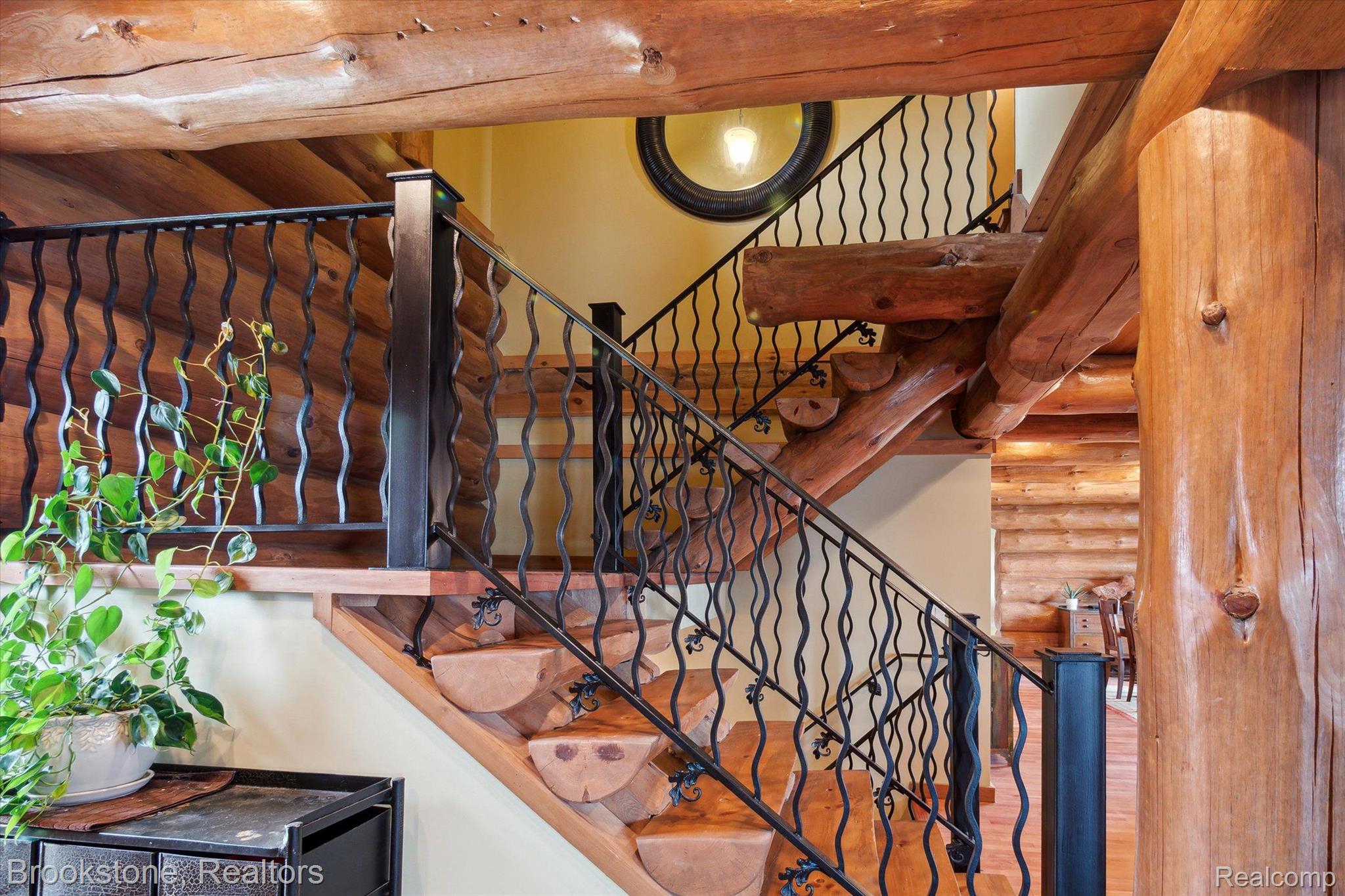 8695 Ellis Road Clarkston, MI 48348 - Photo 27 of 69 Open staircase, local artist designed railing