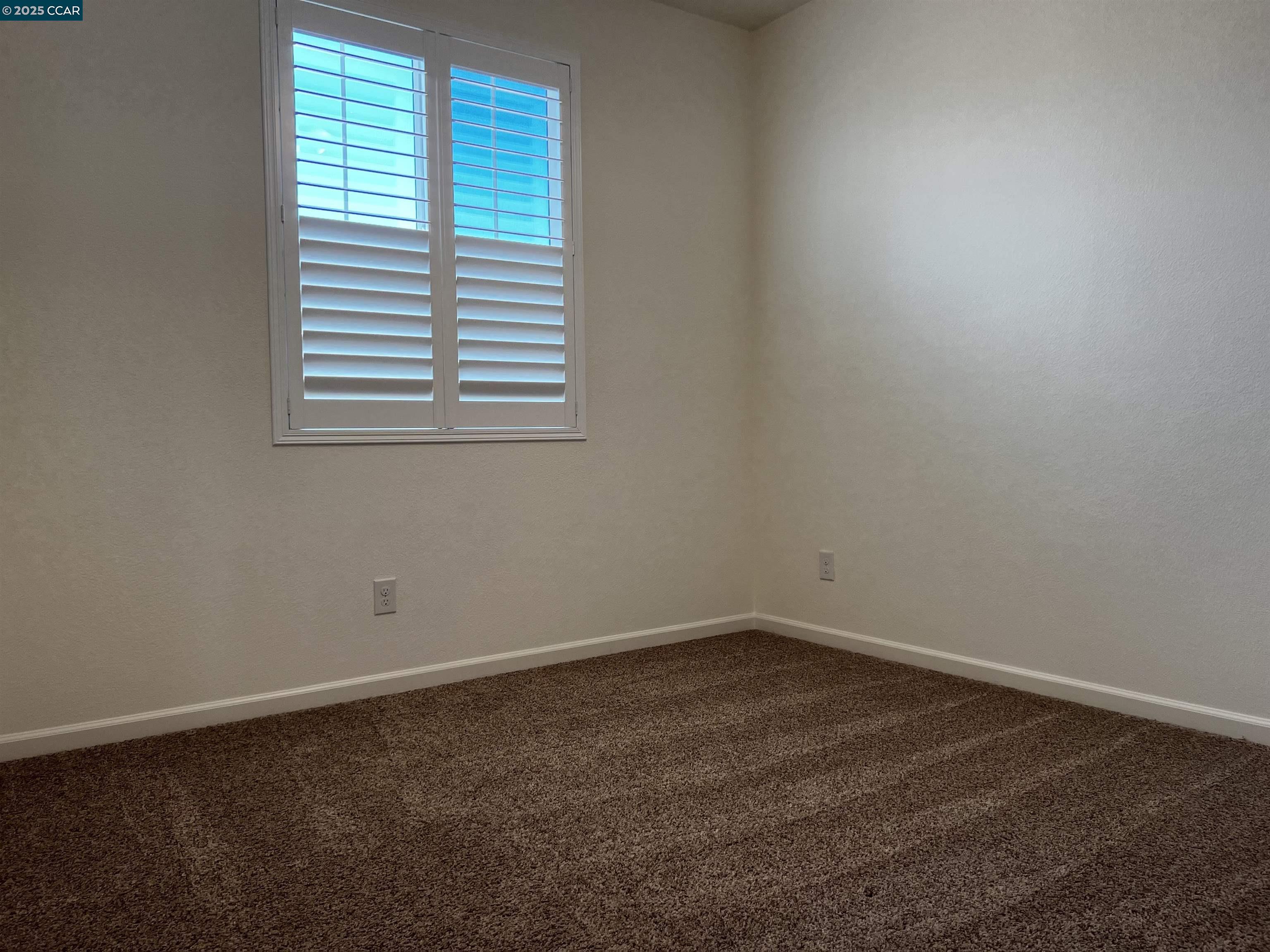 742 Iris Drive Vacaville, CA 95687 - Photo 11 of 23 an empty room with a window
