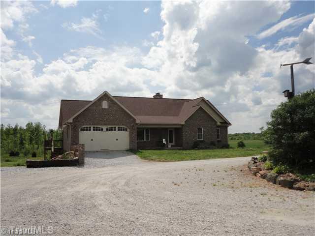 2185 South River Church Road Woodleaf, NC 27054 - Photo 1 of 15 Exterior Front. Beautiful brick home set amist 8 acres, perfect for horses!